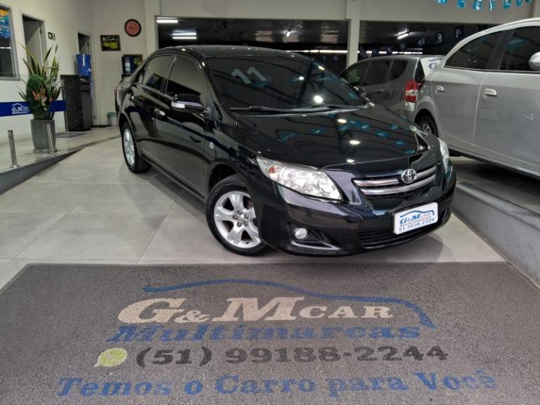 TOYOTA - COROLLA - 2010/2011 - Preta - R$ 62.900,00