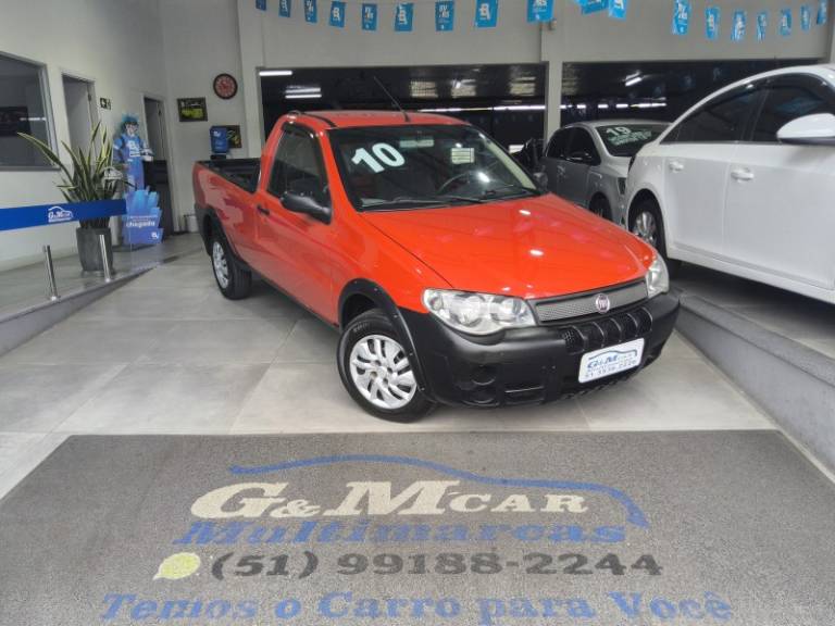 FIAT - STRADA - 2009/2010 - Vermelha - R$ 35.900,00